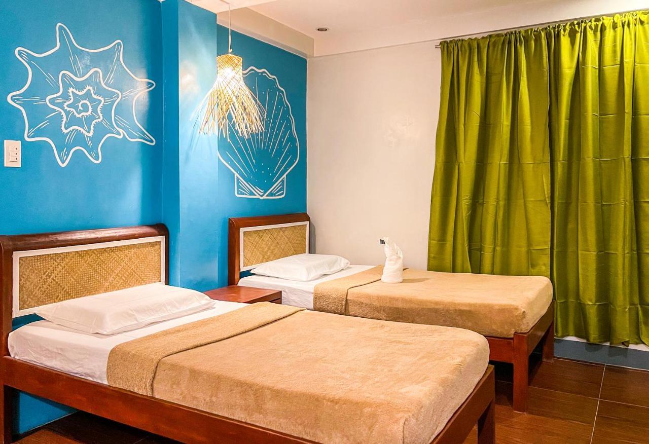 Amos Portside Inn Эль-Нидо Экстерьер фото