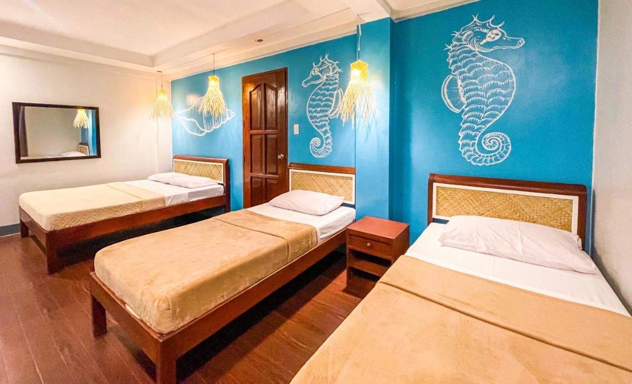Amos Portside Inn Эль-Нидо Экстерьер фото